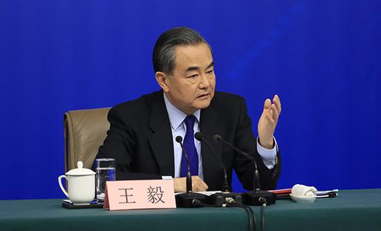 外交部部长王毅出席新闻发布会。澎湃新闻记者 赵昀 图