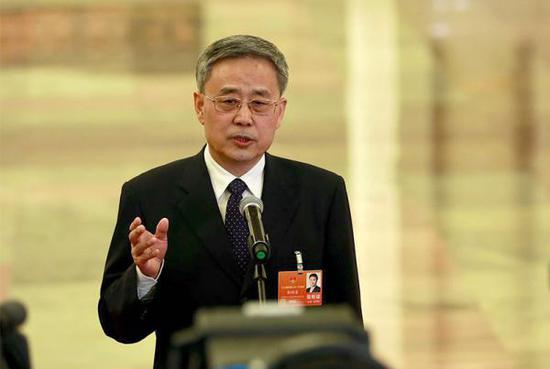 3月9日,银监会主席郭树清接受媒体采访。 视觉中国 图