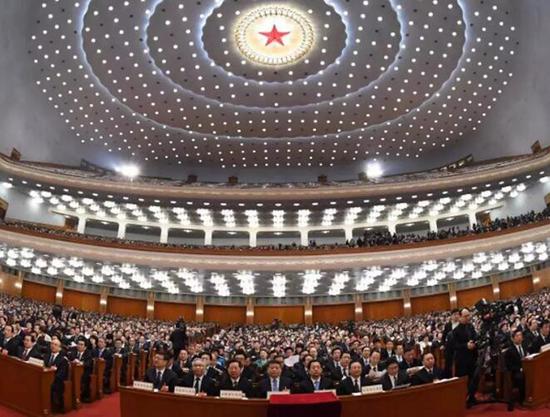 3月13日,十三届全国人大一次会议在北京人民大会堂举行第四次全体会议。新华社 图