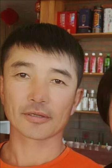 图为被警方悬赏通缉的犯罪嫌疑人。 张林虎 摄