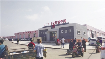 整改后的前不塔气村口
