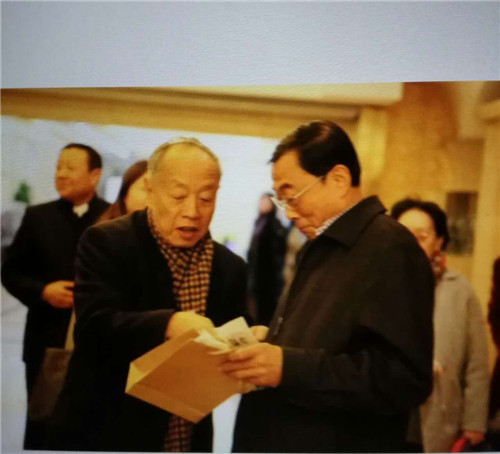 书法家徐耀请教李肇星