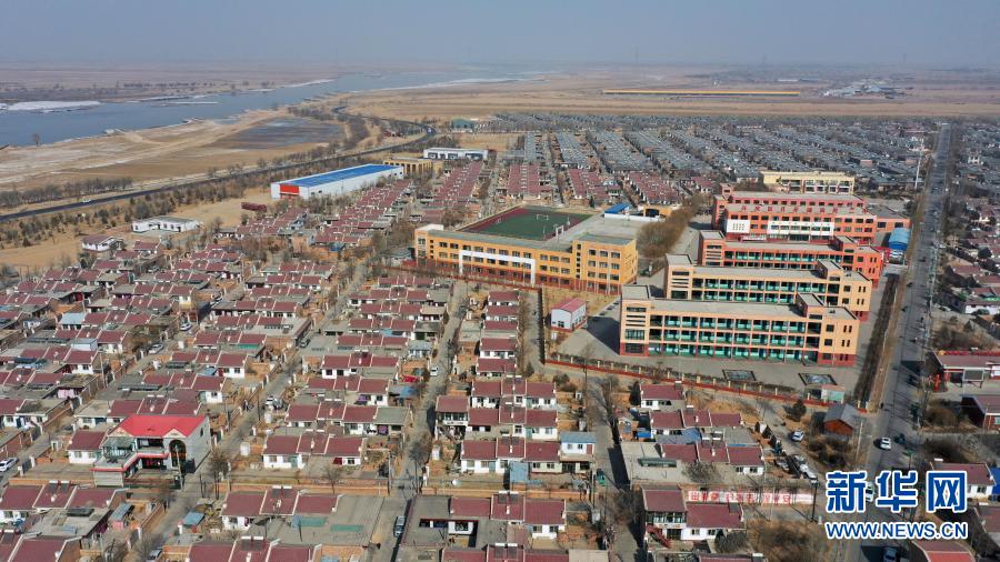 宁夏银川市兴庆区月牙湖乡滨河家园移民村(无人机照片,2021年2月11日摄)。
