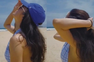 杨采钰穿比基尼海边奔跑