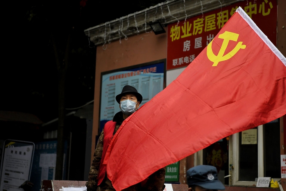 我是社区防控一线的一名老党员 