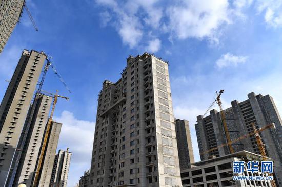 这是长春市生态大街附近的一处在建楼盘(2月22日摄)。 新华社记者 张楠 摄
