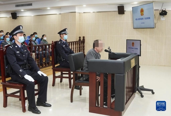 4月6日，被告人董志民在庭審現場。新華社記者 季春鵬 攝