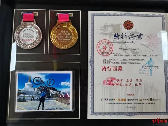 ▲骑行联盟为谢子杰颁发的证书。