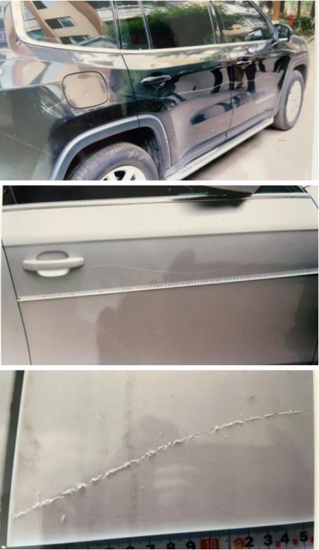 邱某用鑰匙劃花停放在該小區的私家車。龍馬潭區公安分局供圖