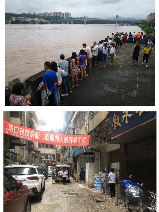 东门口开启“看海”模式，滨江路小区却在集体撤离。陈向前、蔡惠兰摄