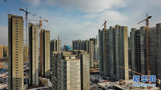 这是长春市生态大街附近的一处在建楼盘(2月22日,无人机照片)。新华社记者 张楠 摄