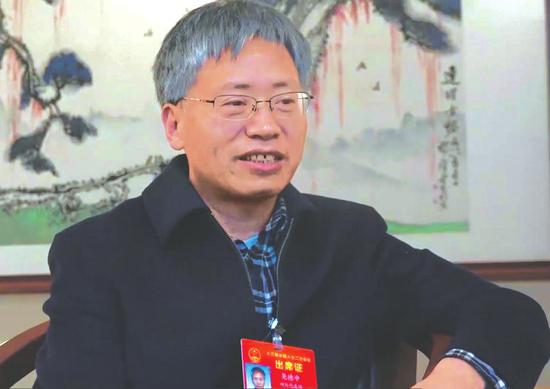 全国人大代表、电子科技大学教授尧德中。