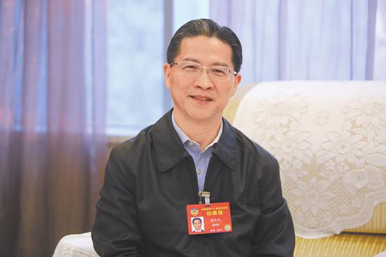 全国政协常委、上海市政协副主席周汉民。