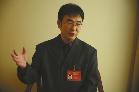 全国人大代表、雅安市人民医院副院长张德明。
