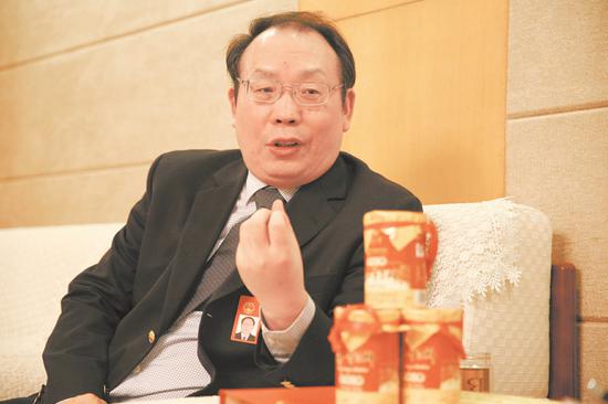 全国人大代表、资阳市委书记周喜安。