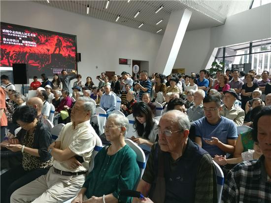 从硝烟中走出的人民艺术家——李少言作品文献展开幕式现场