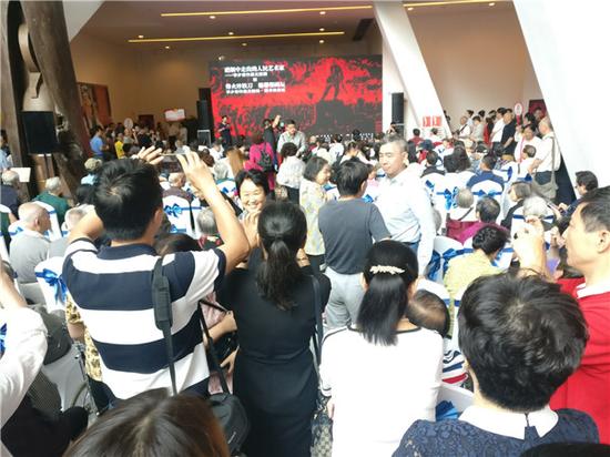 从硝烟中走出的人民艺术家——李少言作品文献展开幕式现场