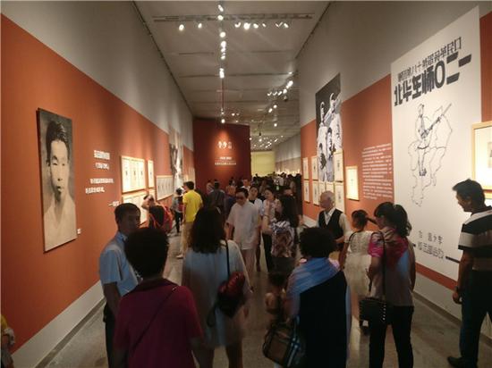 从硝烟中走出的人民艺术家——李少言作品文献展开幕式现场