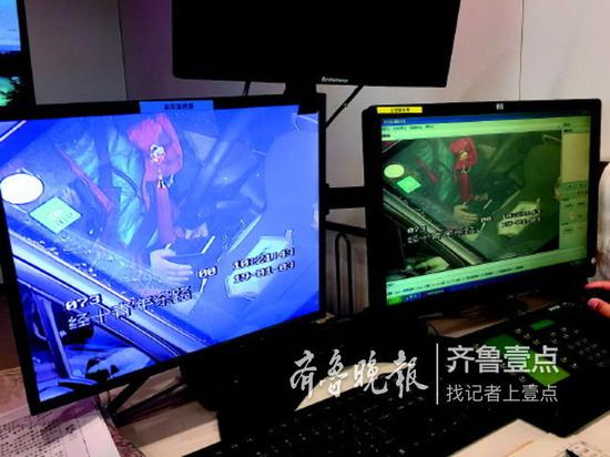 一名司機將手機放在方向盤下操作也被抓拍取證。 (資料片)