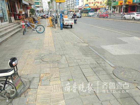華信路部分路段破舊損壞。