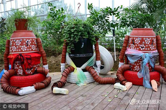 聊城現創意“花盆超人”工藝品,外型呆萌惹人注目。