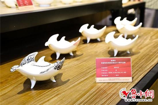 形似鸟又似鱼的一等奖作品《遊》。