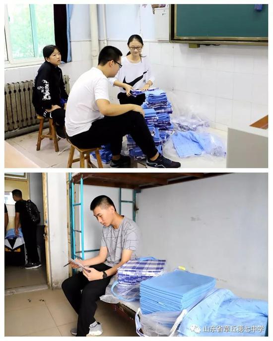 协助班主任发放宿舍用品默默奉献的志愿者同学