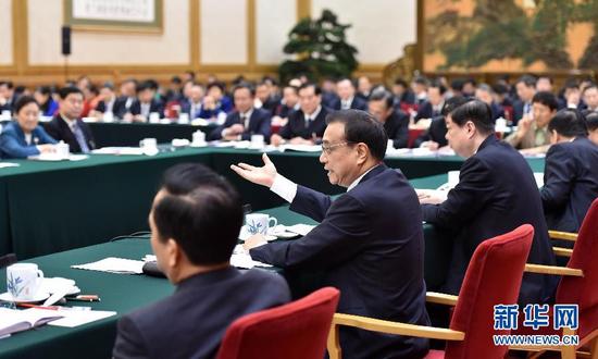 3月6日,中共中央政治局常委、國務院總理李克強參加十二屆全國人大四次會議山東代表團的審議。新華社記者高潔攝
