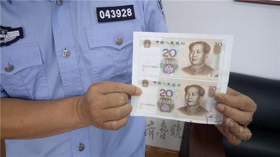 真假币对比,上为打印机造出的假币,下为真币。齐鲁壹点记者 柳斌 摄