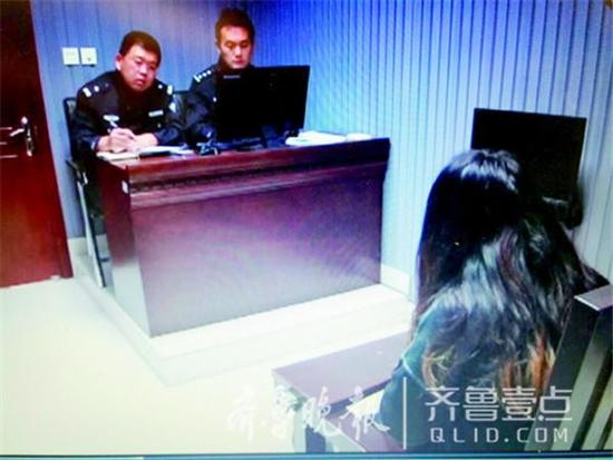 嫌犯王梅接受民警訊問。齊魯晚報(bào)·齊魯壹點(diǎn)記者 尉偉 攝