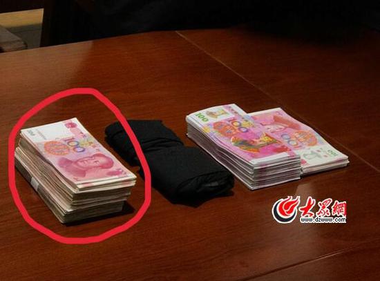 詐騙犯罪嫌疑人用來行騙的道具,圖中只有劃紅圈的是真幣,其余都是所謂的“冥幣”。