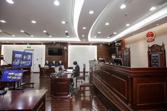 图为远程宣判照片
