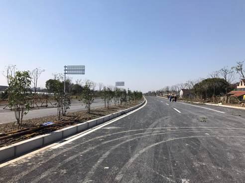 (现场图:团青公路新建工程)