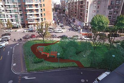 锦建路、伟德路交叉口的三角地,绿地与行人鲜少形成互动。如果能开辟几条小径、设置一些座椅和花坛,就能让行人在此停留、休憩。