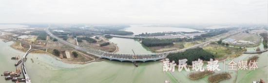 图说:断头路连通极大方便了两地居民来往。徐程 摄