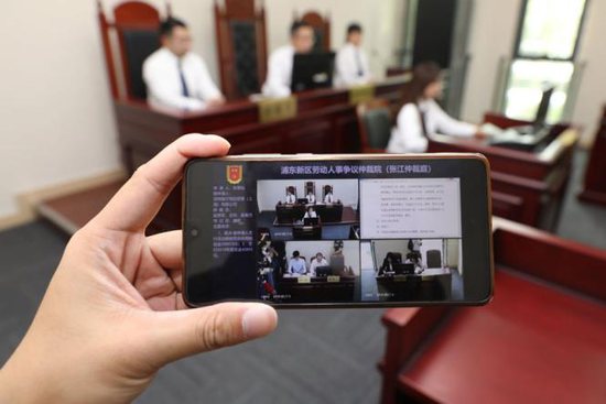 张江科创仲裁庭实现庭审流程和庭审信息双公开。新华网 发