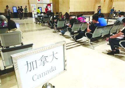 上海叫停个签代办 签证中心:有资质的旅行社仍