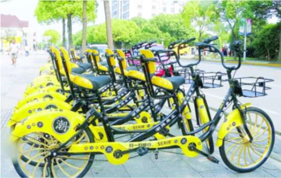 松江大学城现双人共享单车 警方责令企业全部