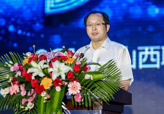 图为副省长王一新在大会上致辞。