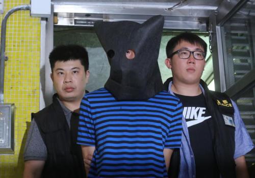 涉嫌3起九龙巴士插针案的男子被捕。图片来源:香港《大公报》 黄洋港/摄