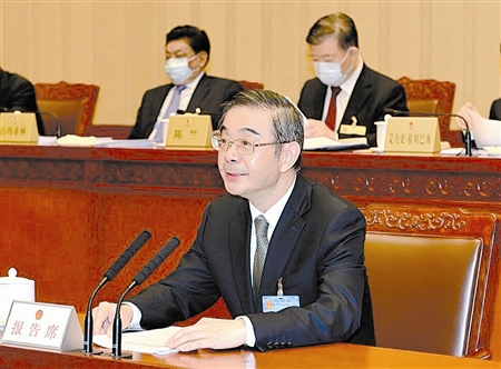 2月27日,最高人民法院院长周强向全国人民代表大会常务委员会作关于民事诉讼程序繁简分流改革试点情况的中期报告。马增科 摄