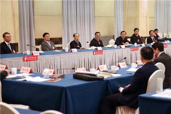 图为 周强参加十三届全国人大一次会议河南代表团审议。孙若丰 摄