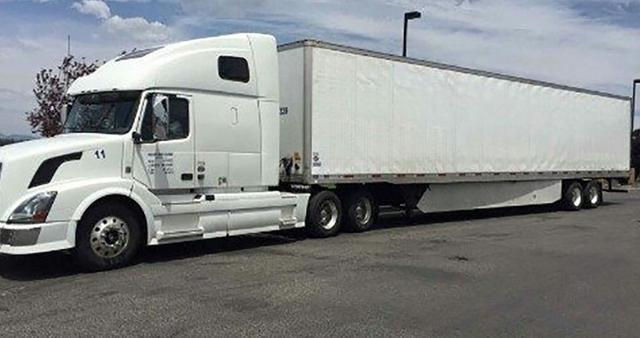 华人在美国开卡车年入五十万,住别墅开宝马比