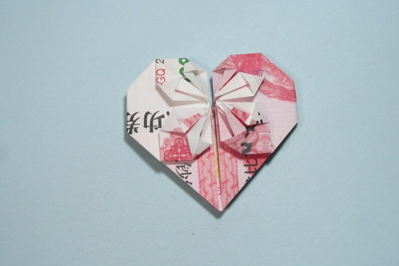 用人民币折纸爱心详细图解 放在钱包里的爱心