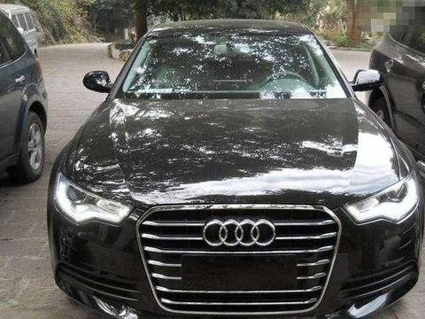 河南小伙18万提奥迪A6L，手动挡库存车，16寸轮毂堪称国内独一份