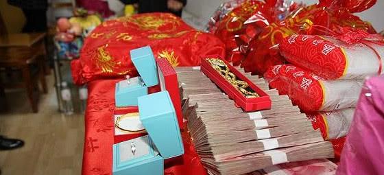 婚风俗三斤三两百元大钞换算人民币是多少钱?