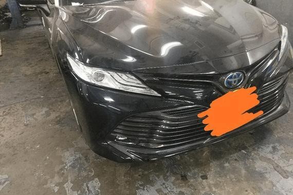 男子提18款丰田凯美瑞混动版，车主：这内饰档次不输奔驰宝马