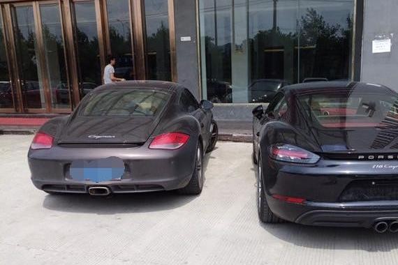 花86万落地保时捷718: 街上偶遇宝马i8, 车牌成为亮点