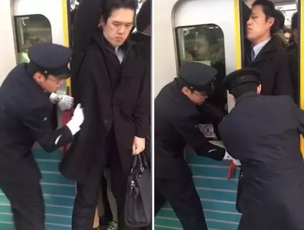 日本地铁太挤乘客被推上车