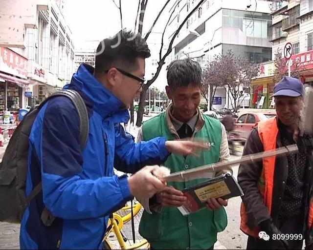 新闻特写：他们坚守寒风中 8099999主播送温暖